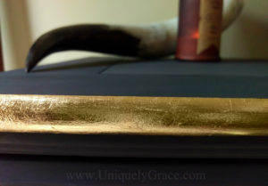 LOGO Gold leaf close up pure origional uniquely grace black truffle dresser